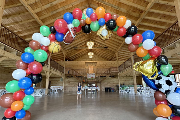 Birthday party celebration at Windsor Place event venue with decorations and mountain views